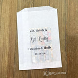 Wedding scratch off favor bags, slide a lottery ticket inside for an interactive favor.  Bags will accept larger  scratch offs.  Personalized for the bride and groom, printed with 'eat, drink & get lucky'.  Bags are transluscent glassine.