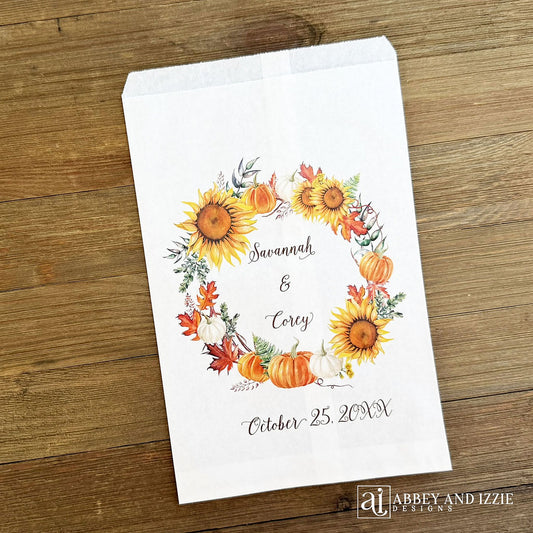 Personalized Autumn Wedding Favor Bags, adorned with a fall wreath. Bags are larger than most and hold lots of goodies.