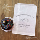 Bridal shower donut bags personalized for the bride to be.  Our glassine bags are grease resistant and perfect for donut bars, donut favors or a donut wall.  Larger than most donut bags these will be a hit as a party favor.  Each printed 'donut leave without a treat' with the brides name, bridal shower and date.