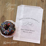 Bridal shower donut bags personalized for the bride to be.  Our glassine bags are grease resistant and perfect for donut bars, donut favors or a donut wall.  Larger than most donut bags these will be a hit as a party favor.  Each printed 'donut leave without a treat' with the brides name, bridal shower and date.