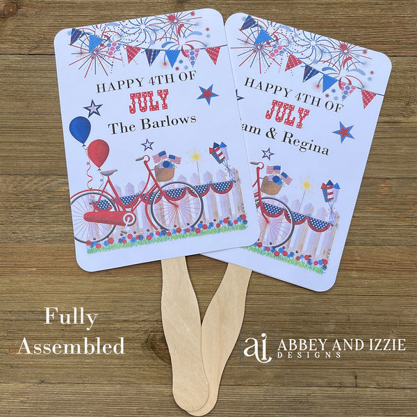 Your guests will thank you for the cool breeze these 4th of July fans will bring.  With red, white and blue accents fans are printed on white card stock, two sided with hand hidden between.  They ship fully assembled and ready for your event.