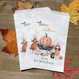 White paper bags, Personalized Halloween Candy Bags, adorned with cute witches these can be used for trick or treat bags or trunk or treat bags.  Also can personalized for a business promotion to hand out at Halloween.