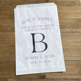 Monogrammed Wedding bags, printed with love is sweet thank you for making our day complete with your large initial in the center.  Personalized wedding favor bags are larger than most, perfect for a candy buffet, cookie buffet, popcorn or whatever you desire.