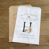 Monogrammed Fall Wedding Favor Bags, perfect for fall weddings.  Adorned with fall accents they will fit your fall wedding theme perfect.  Personalized for the bride and groom and large initial.  Your choice of white or brown bags.