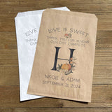 Monogrammed Fall Wedding Favor Bags, perfect for fall weddings.  Adorned with fall accents they will fit your fall wedding theme perfect.  Personalized for the bride and groom and large initial.  Your choice of white or brown bags.