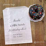 Our personalized wedding donut bags will add a special touch to your donut bar.  Each bag is printed 'thanks a hole bunch for celebrating with us!' with the bride and grooms name and wedding date.  Bags are glassine and grease resistant.  Also great for donut walls.