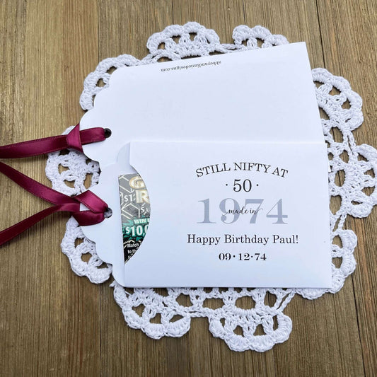Unique 50th Birthday Party Favors, personalized for the guest of honor. These favors will add some fun to the event, slide a instant lotto ticket in to see who wins. Your choice of envelope and ribbon color.