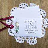 Still nifty at 50 birthday party favors, personalized for the guest of honor.  These favors will add some fun to the event, slide a instant lotto ticket in to see who wins.  Your choice of envelope and ribbon color.