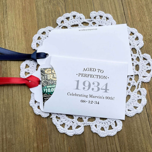 Aged to perfection Party Favors for 90th Birthday. These fun and easy birthday favors are sure to be a hit with your guests. Slide a instant lotto ticket in the open end of the envelope and see who wins. Your choice of envelope and ribbon color, personalized for any birthday.