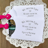 Fun wedding favors personalized, 'we tied the knot we hope you hit the jackpot'.  Lottery ticket wedding favors, slide a scratch off in the open end and see who wins.  Personalized for the bride and groom with your choice of colors.