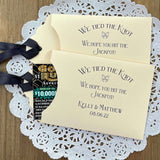 Fun wedding favors personalized, 'we tied the knot we hope you hit the jackpot'.  Lottery ticket wedding favors, slide a scratch off in the open end and see who wins.  Personalized for the bride and groom with your choice of colors.