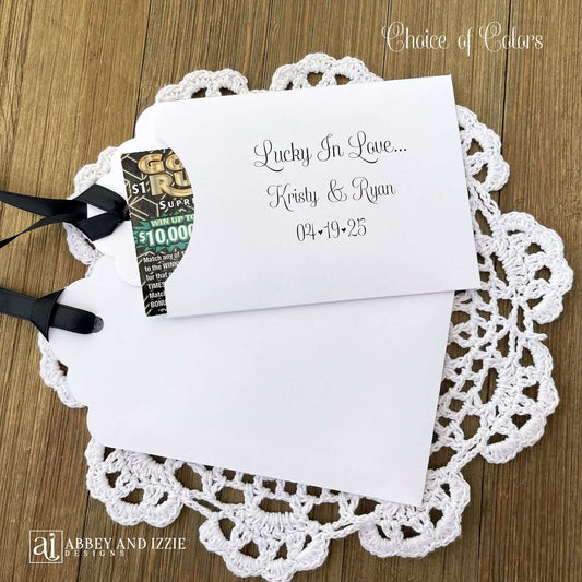 Wedding Lottery Ticket Envelopes Personalized, lucky in love printed on each, slide a lotto ticket in for a fun and easy wedding favor. Personalized for the bride and groom, your choice of envelope and ribbon color.