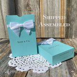 Tiffany & co. Personalized Favor Boxes for any Event.  Boxes feature white ribbon around the top adorned with a white box.  Great for candy or any sweet treat.