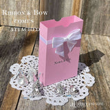 Personalized pink favor boxes with bow for the guest of honor.  Made from pink card stock with white ribbon and bow around the top which comes attached.