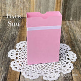 Personalized pink favor boxes with bow for the guest of honor.  Made from pink card stock with white ribbon and bow around the top which comes attached.
