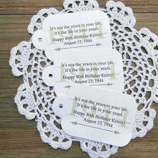 Milestone Birthday Favor Tags, printed on white card stock adorned with a beautiful saying and the birth year. Comes with hole punched for easy use, your choice of year color to match your party theme. Adult favor tags to add that special touch to your guests favors.