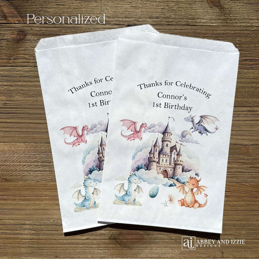 Delight your young dragon enthusiasts with these personalized birthday favor bags—the perfect way to send guests home with a magical memento. Each dragon birthday favor bag can be customized with your child's name and birth year. Printed on white bags and adorned with a magical castle and cute colorful dragons.