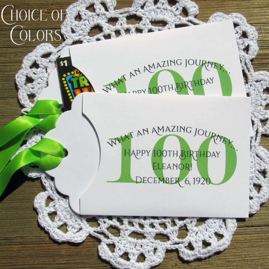 These 100th Birthday Party Favors Personalized for the honoree with name and birthdate. Each envelope is printed on white card stock with your choice of colors to match your party theme. Ribbon comes attached, slide a lottery ticket in the open end and see which guest wins.