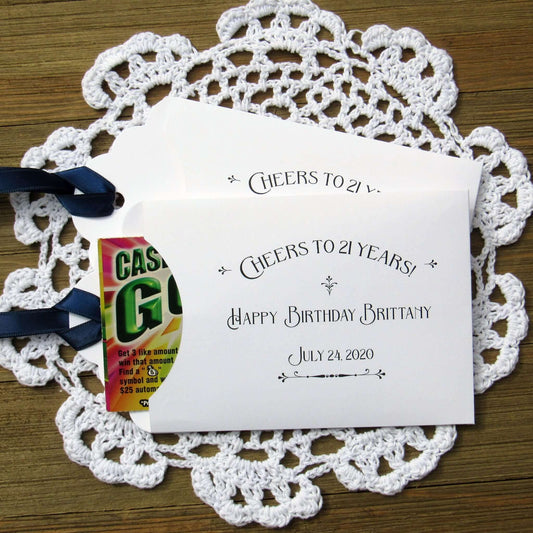 Fun 21st Birthday Party Favors are personalized for the guest of honor, slide a lotto ticket in these cute envelopes to see who goes home a winner.