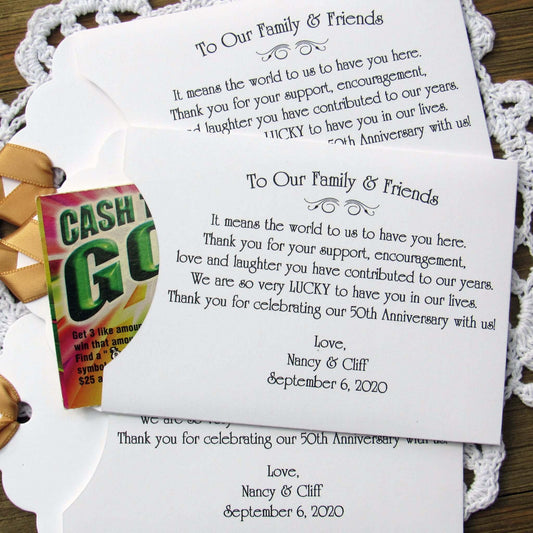 Personalized 50th Wedding Anniversary Party Favors, with a sweet saying to let your friends and family know how much they mean to you. Printed on white envelopes with a gold ribbon attached.