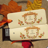 Thanksgiving Table Favors that are personalized for a elegant touch.  Constructed from ivory card stock, these are sturdy candy bar favors, just slide the candy bar in the open end and tie the ribbon on.