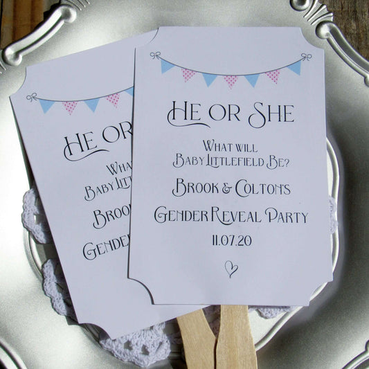 Gender Reveal Party Fans printed on white cardstock, two sided with wooden handle hidden between, printing on one side only. They arrive to you fully assembled and ready for your event.