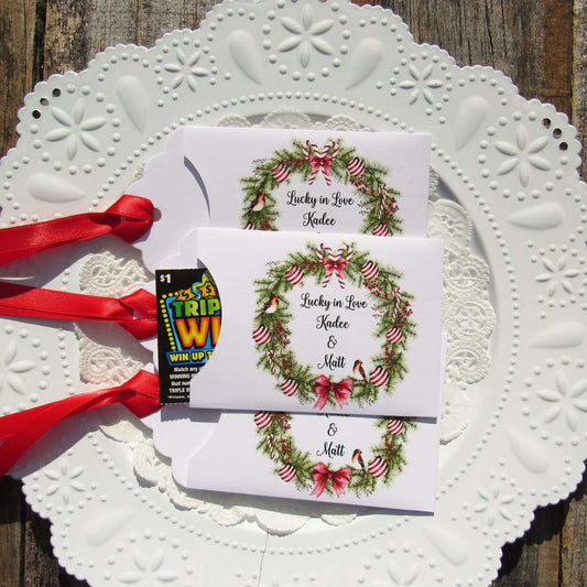 Fun Winter Wedding Reception Favors printed on white card stock with a holiday wreath these are personalized for the bride and groom. Adorned with a ribbon which comes attached. Our wedding lottery favors are sure to be a hit.