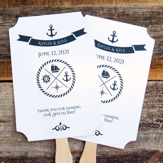 Personalized Nautical Theme Wedding Fans printed on white card stock with navy text. Hand fans are personalized for the bride and groom, fans ship assembled and ready to use. Two sided with handle hidden between for a more finished look.