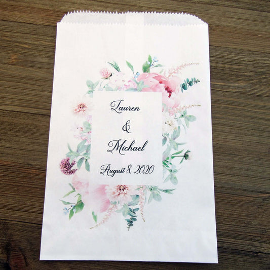 Pink Floral Wedding Favor Bags Personalized for the bride and groom. White bags printed with a pink floral frame, bags are larger than most and can be used for a candy buffet, cookie bags or popcorn bags.