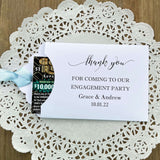 Personalized engagement party favors, envelopes for a lotto ticket  party favor.  Your choice of envelope color and ribbon color to match your party theme.  Celebrate your engagement in style with these unique engagement party favors.
