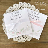 Tea Party Baby Shower Favors add your favorite tea bags to these envelopes for a sweet baby shower favor.  Tea for two, perfect for a twin baby shower.  Adonred with tea pot and cups in pink and white.