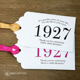 Our 100th birthday party favors are personalized for the guest of honor, your choice of ribbon color and year color. Always a fun ice breaker, slide a scratch off ticket in and see who is the winner! Each 100th birthday favor comes with the year the honoree was born printed in the center with 'It's not the years in your life...it's the life in your years' and happy birthday to the guest of honor. These can be made for any birthday year, 50th, 60th, 70th, 100th your choice. 100th Birthday Party Favors