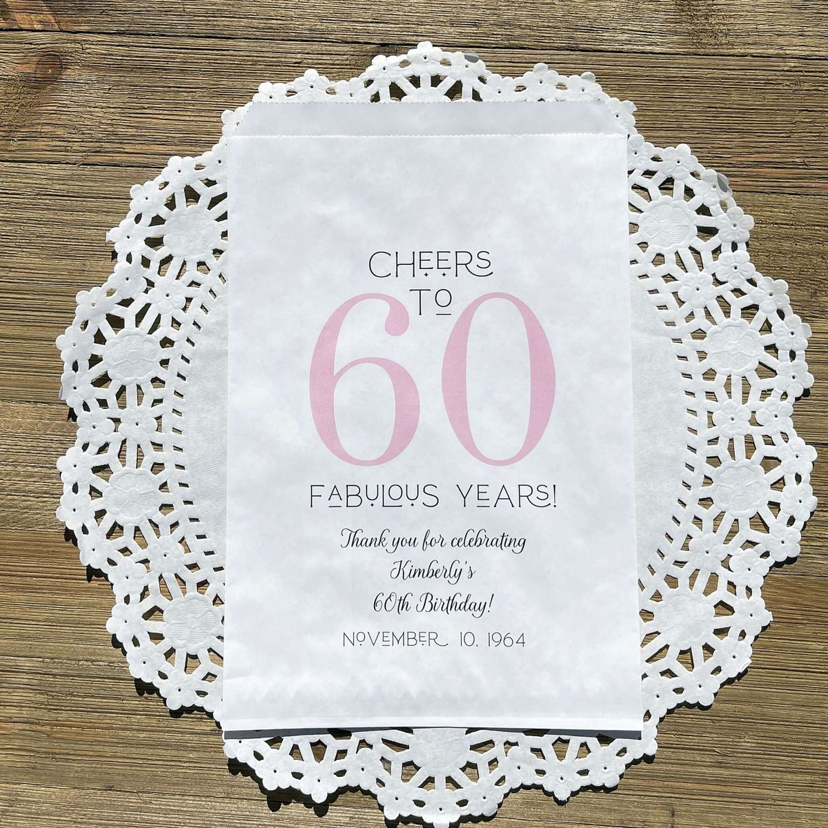 Personalized 60th Birthday Party Favor Bags, printed with 'cheers to 60 fabulous years!'  thanking your guests for attending.  Bags are large enough for cookie bags.