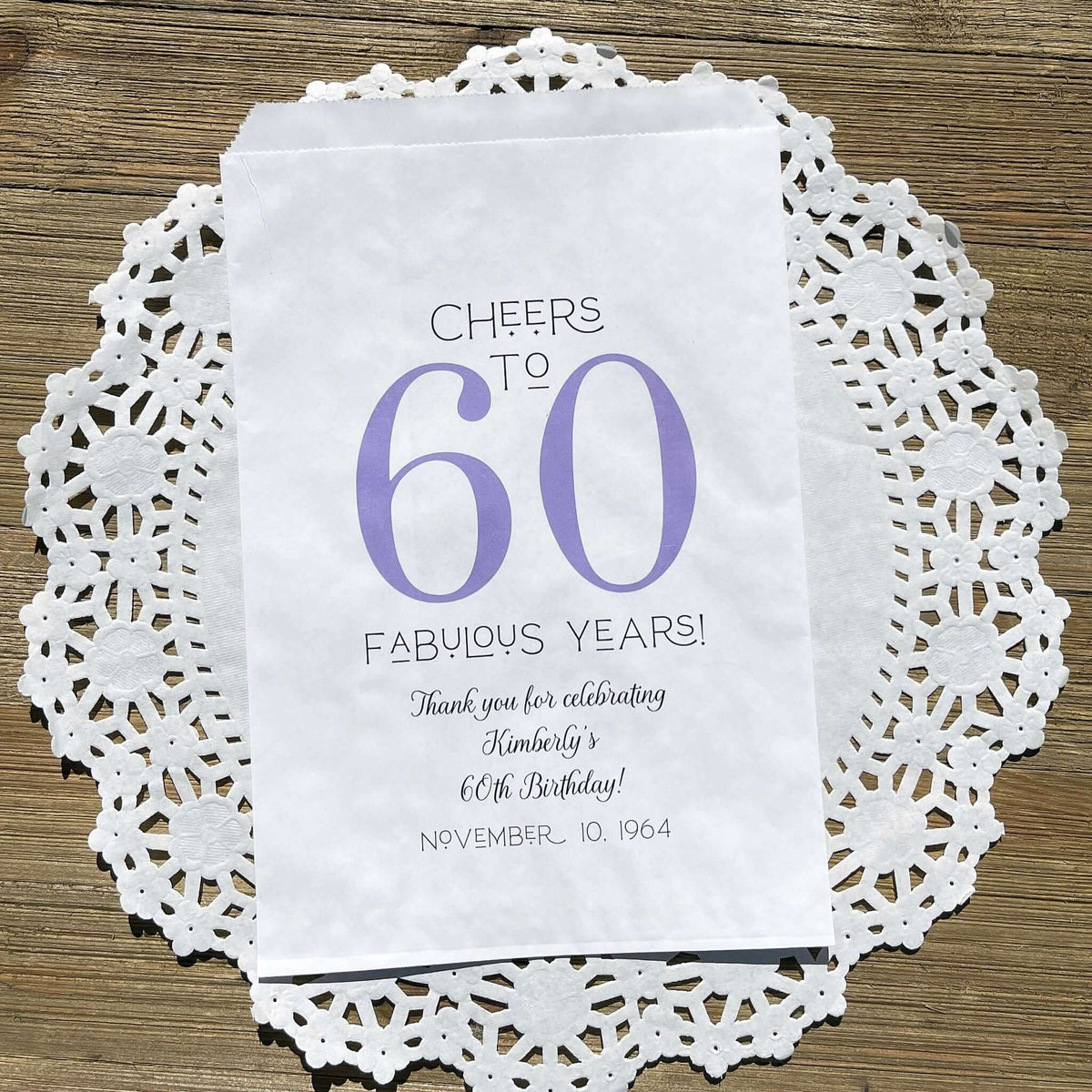 Personalized 60th Birthday Party Favor Bags, printed with 'cheers to 60 fabulous years!'  thanking your guests for attending.  Bags are large enough for cookie bags.