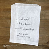 Celebrate autumn love with charming apple cider donut favor bags, perfect for fall weddings and bridal showers. Each bag captures the cozy essence of the season, delighting guests with a warm, seasonal treat they'll remember. Ideal for outdoor ceremonies, rustic venues, or intimate gatherings. Customize with names, date and a thank you message to add a heartfelt touch. These favors work beautifully as thank-you gifts, dessert table accents, or take-home keepsakes.