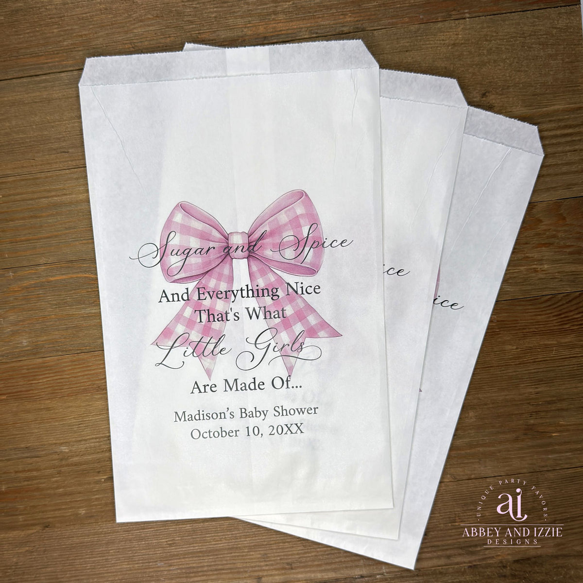 Sugar and Spice Baby Shower Bags with Pink Bow are the perfect keepsake favor for celebrating a new arrival. Each bag features a charming pink bow and arrives ready to fill with treats, chocolates, or small gifts, personalized for the Mom to be with event date.