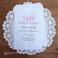 Babies are sweet enjoy a treat thank you for making my day complete. Adorned with a pink bow and personalized for the mother to be these bags are perfect for a candy bar or any sweet treat for your guests.
