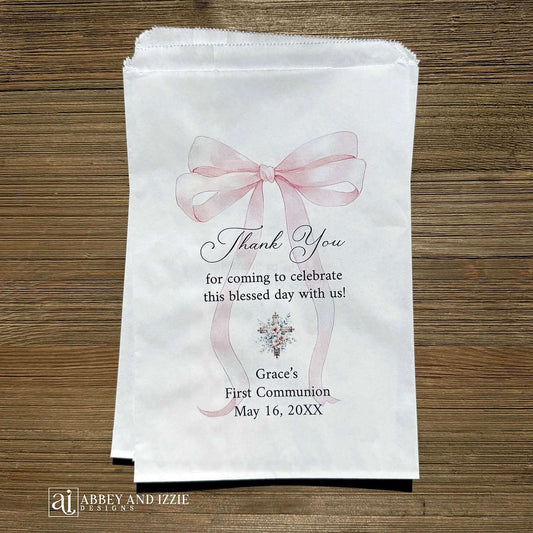 Girls First Communion Favor Bags Personalized, celebrate her spiritual milestone with refined elegance. These personalized favor bags bring understated sophistication to her first communion, featuring her name, date and a thank you to your guests.&nbsp; Perfect for presenting rosaries, prayer cards, or thoughtful tokens of appreciation. 