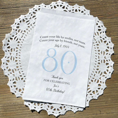 These 80th Birthday Favor Bags, personalized for the guest of honor for an 80th birthday party.  Printed on white bags your choice of large number color.  Larger than most favor bags these are perfect for many sweet treats for your party guests.  A fun bag for an 80th birthday celebration.