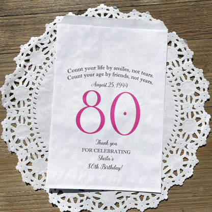 These 80th Birthday Favor Bags, personalized for the guest of honor for an 80th birthday party.  Printed on white bags your choice of large number color.  Larger than most favor bags these are perfect for many sweet treats for your party guests.  A fun bag for an 80th birthday celebration.