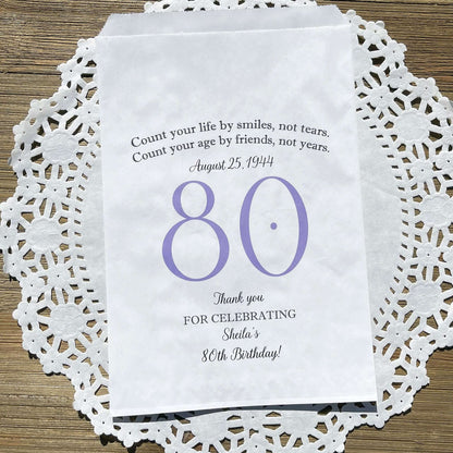 These 80th Birthday Favor Bags, personalized for the guest of honor for an 80th birthday party.  Printed on white bags your choice of large number color.  Larger than most favor bags these are perfect for many sweet treats for your party guests.  A fun bag for an 80th birthday celebration.