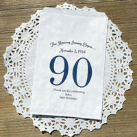 Our 90th birthday party favors bags are personalized for the guest of honor with a large 90 printed, birth date and a thank you to your guests.  Adult favor bags are larger than most and can be filled with many different treats.  Favor bags are white with large 90 printed in 9 colors to choose from.
