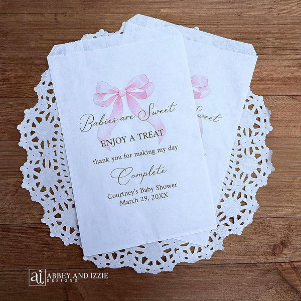 Babies are sweet enjoy a treat thank you for making my day complete.  Adorned with a pink bow and personalized for the mother to be these bags are perfect for a candy bar or any sweet treat for your guests.  