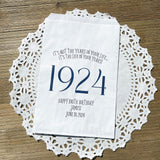 Adult favor bags for any birthday year. White bags with the year the guest of honor was born printed with their birth date. Your choice of colors, adorned with a sweet message.