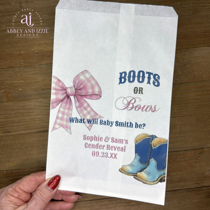 Celebrate the big reveal with Boots or Bows Gender Reveal Bags — the perfect party favor for your special announcement.  White bags personalized for the parents to be, adorned with a pink bow and blue boots to highlight the theme.