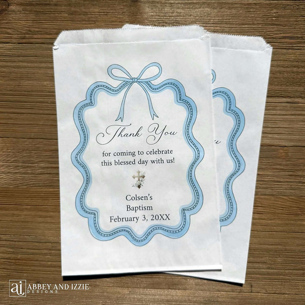 Blue Bow Baptism Favor Bags Personalized, transform your baptism celebration with custom favor bags that reflect the uniqueness of your special day. These expertly crafted bags feature an elegant blue bow and can be personalized with your child's name, baptism date, and a meaningful message.