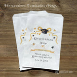Graduation favor bags, personalized with  the guest of honors name and event date.  Adorned with a gold ribbon, gold and black stars and black graduation cap.  Bags can be used for sweet treats, take home thank you gift, cookies, candy or perfect for utenisl bags.  