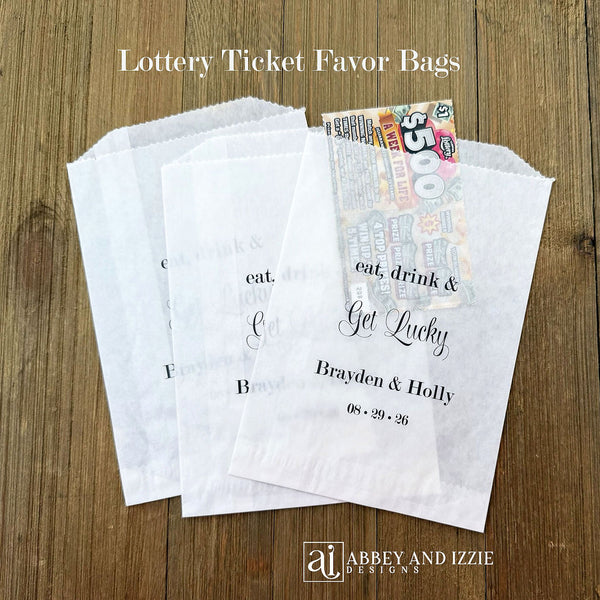 Wedding scratch off lotto favor bags, slide a lottery ticket inside for an interactive favor.  Bags will accept larger  scratch offs.  Personalized for the bride and groom, printed with 'eat, drink & get lucky'.  Bags are transluscent glassine.  