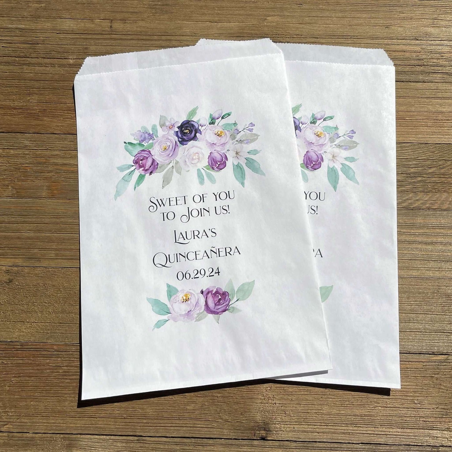 Purple Personalized Quinceanera Favor Bags, perfect for cookies,  sweet treats or candy buffet bags.  Bags are white with purple flowers printed for an elegant touch.  Personalized for the guest of honor.
