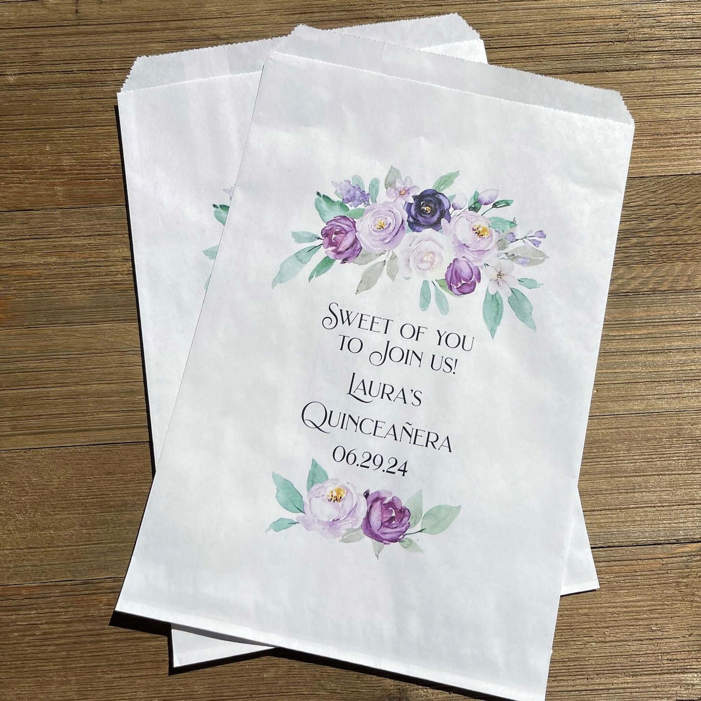 Purple Personalized Quinceanera Favor Bags, perfect for cookies,  sweet treats or candy buffet bags.  Bags are white with purple flowers printed for an elegant touch.  Personalized for the guest of honor.
